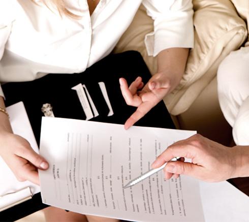 people signing legal forms